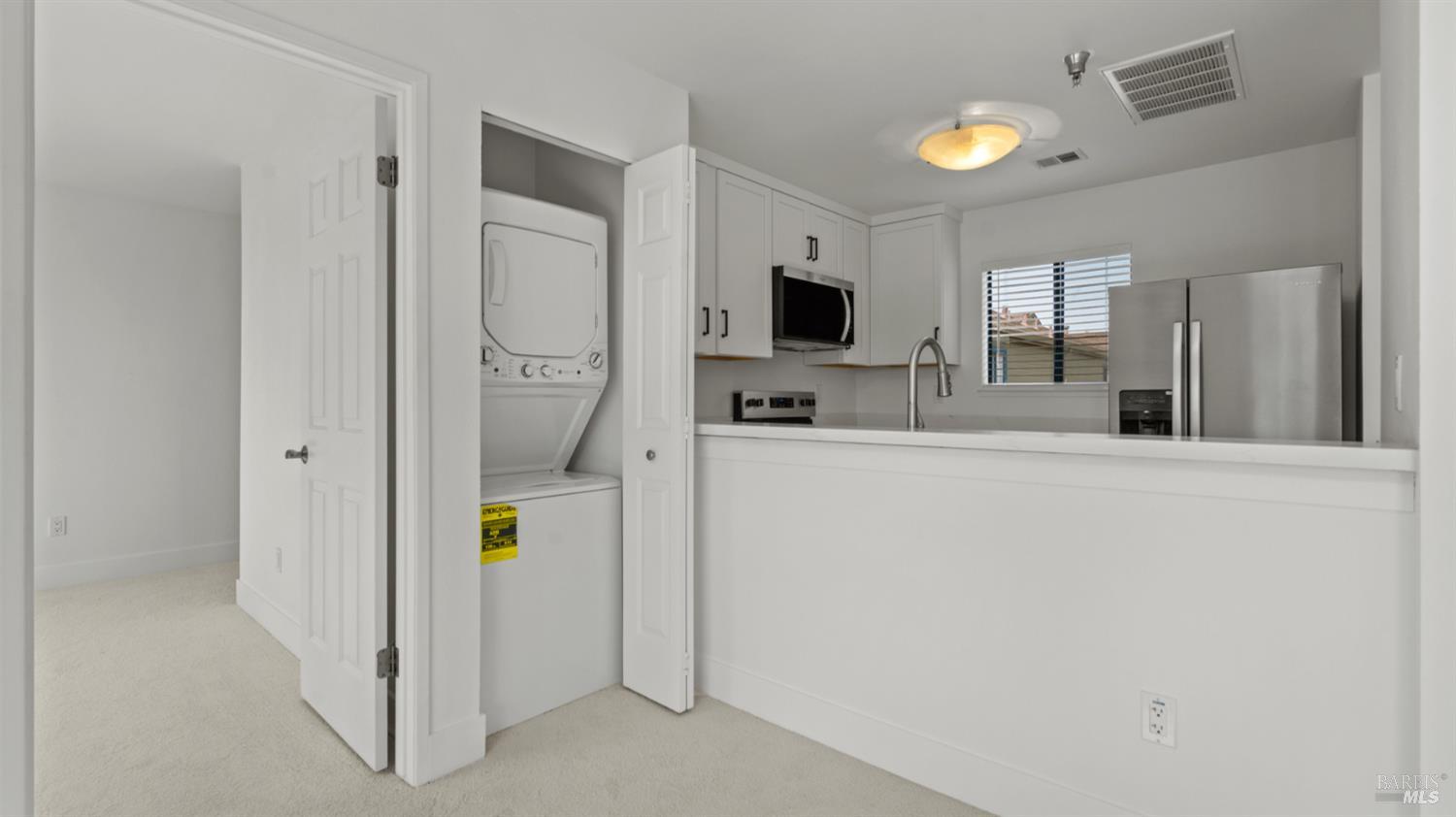 302 Mariner Way Novato, CA 94945 - Photo 10 of 20 a living room with furniture and a flat screen tv