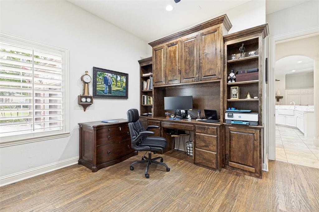 971 Elk Ridge Road Prosper, TX 75078 - Photo 18 of 29 Fourth bedroom featuring extensive custom built-in cabinetry and an ensuite bath!