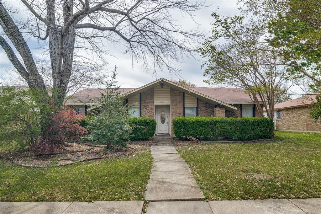3306 Ardis Drive Rowlett, TX 75088 - Photo 1 of 1 front view of a house with a yard