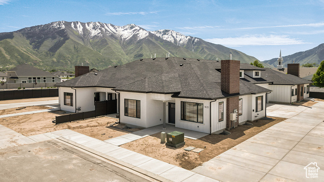 1631 West Century Lane, Unit B Mapleton, UT 84664 - Photo 33 of 33 View of front of house with a chimney, a shingled roof, and a mountain view
