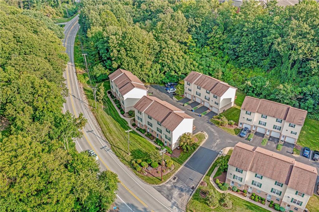 820 Mt Pleasant Road Greensburg, PA 15601 - Photo 27 of 30 an aerial view of a house with a garden and trees