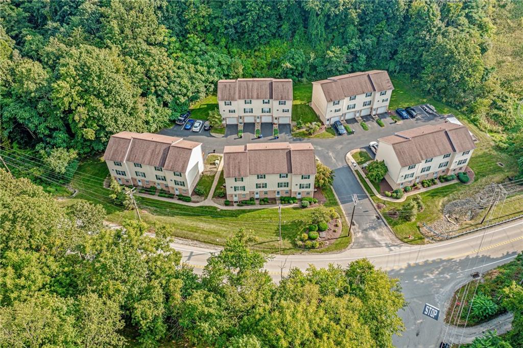 820 Mt Pleasant Road Greensburg, PA 15601 - Photo 28 of 30 an aerial view of a house with garden space and trees