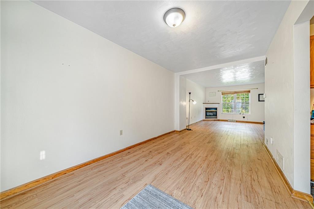 820 Mt Pleasant Road Greensburg, PA 15601 - Photo 7 of 30 a view of empty room with wooden floor