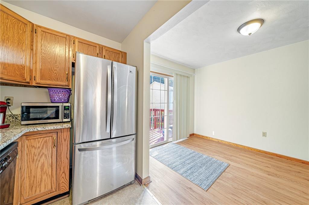 820 Mt Pleasant Road Greensburg, PA 15601 - Photo 9 of 30 a kitchen with stainless steel appliances a refrigerator and microwave