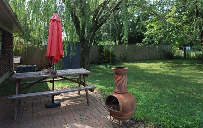 1576 Springfield Drive Lexington, KY 40515 - Photo 14 of 19 Brick Patio overlooking private backyard