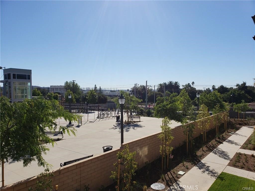 879 Iris Way, Unit A Azusa, CA 91702 - Photo 16 of 21 a view of a lake from a balcony