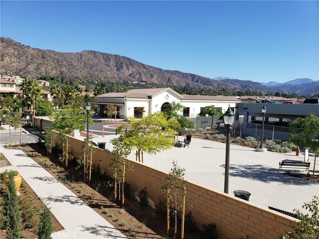 879 Iris Way, Unit A Azusa, CA 91702 - Photo 17 of 21 a view of a house with a ocean view