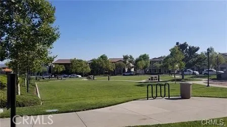 a view of swimming pool with outdoor seating and outdoor seating