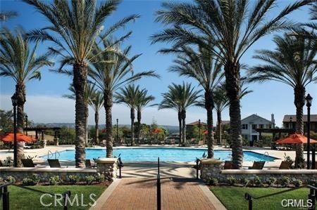 879 Iris Way, Unit A Azusa, CA 91702 - Photo 21 of 21 a view of swimming pool with outdoor seating and outdoor seating