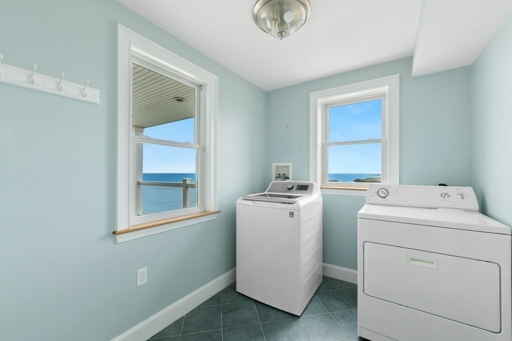 16 Burr Road Hull, MA 02045 - Photo 19 of 25 a view of storage and utility room with washer and dryer