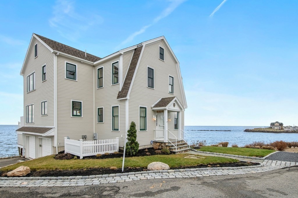 16 Burr Road Hull, MA 02045 - Photo 2 of 25 a front view of a house with a yard