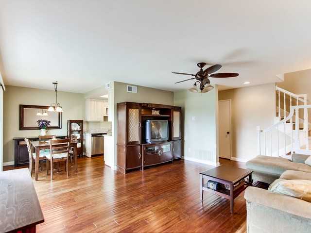 740 Pyramid Point Way Oceanside, CA 92058 - Photo 8 of 23 Beautiful plank wood style floors downstairs add drama