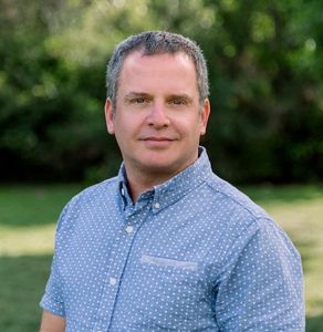 Headshot of Jon Sisenwein