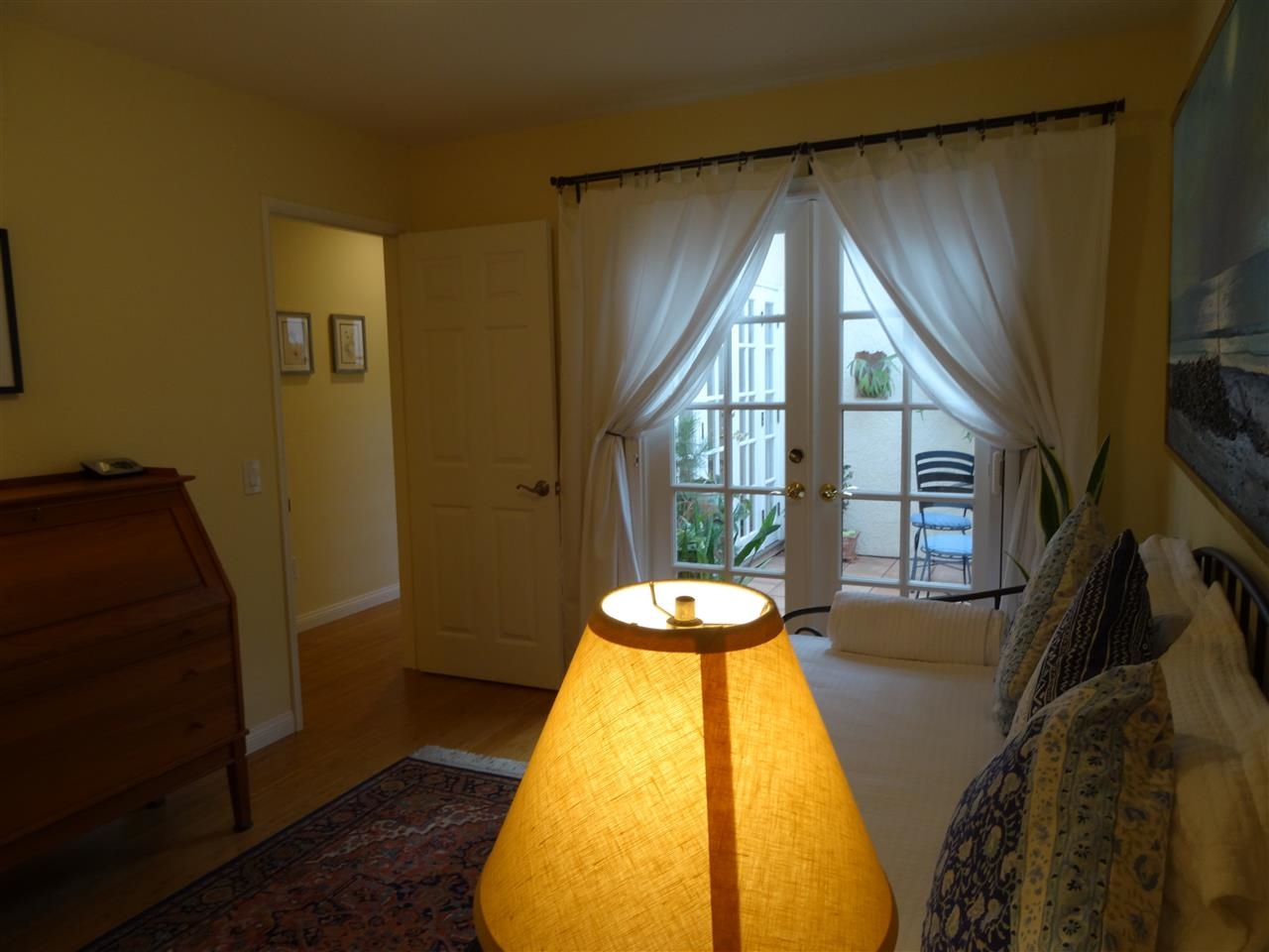 13312 Pantera Road San Diego, CA 92130 - Photo 9 of 25 Second bedroom with French doors opening onto private patio.