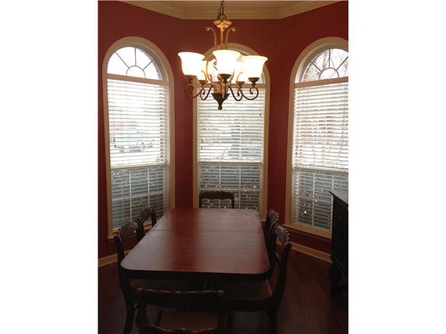 8614 Brer Rabbit Cove Memphis, TN 38018 - Photo 2 of 13 Formal Dining Room with Bay Window and Wood Floors.