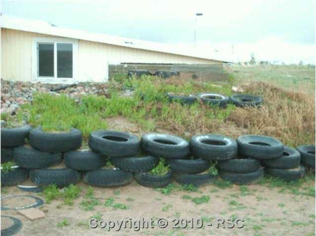 15825 South Lauppe Road Yoder, CO 80864 - Photo 7 of 12 SHOW HOW HOME BACKS INTO THE EARTH