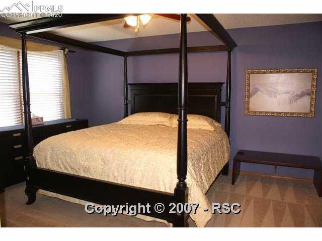 7215 Julynn Road Colorado Springs, CO 80919 - Photo 7 of 12 Master Suite offers Adjoining Bath & Walk-in Closet.