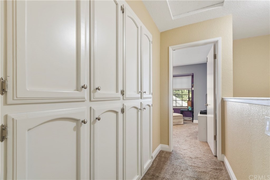 628 4th Street Paso Robles, CA 93446 - Photo 16 of 22 Loads of cupboard storage cabinets in the upstairs hall
