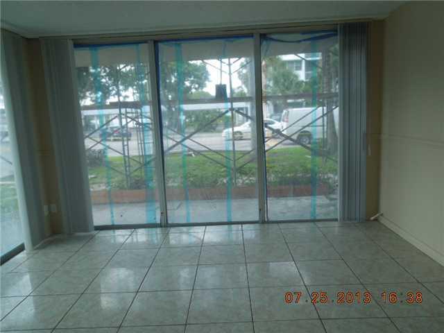 700 Northwest 214th Street, Unit 101 Miami, FL 33169 - Photo 7 of 12