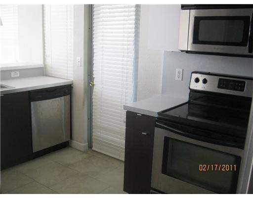 6835 Rue Versailles Drive, Unit 205 Miami Beach, FL 33141 - Photo 3 of 7