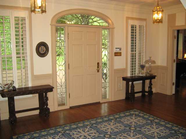 2287 Johnson Road Germantown, TN 38139 - Photo 8 of 9 Formal entry. Plantation shutters, hardwood floors and much, much more! 3rd. floor attic. custom stain glass windows. Stero intercom. Master with private his and her's bathrooms. Guest suite downstairs.