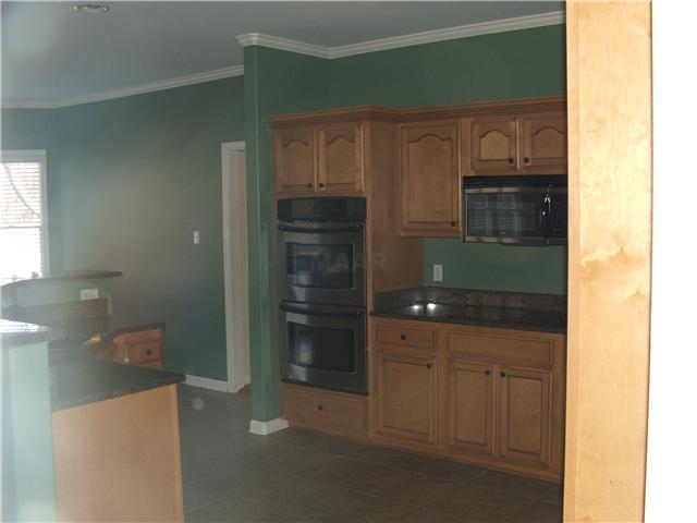 1240 Yorktown Road Collierville, TN 38017 - Photo 4 of 12 Double Ovens! Smooth Cooktop. Walk-in Pantry in the Kitchen and second one in the hall.