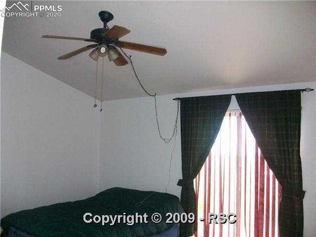 17445 Sage Crest Road Peyton, CO 80831 - Photo 5 of 9 Master Bedroom with updated ceiling fan.