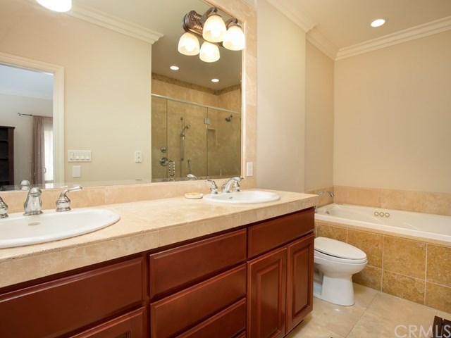 2302 Grant Avenue, Unit 2 Redondo Beach, CA 90278 - Photo 22 of 29 Grand ensuite featuring double sinks, decorative tile back splash, separate tub and extra-large frameless shower