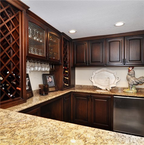 7 Estates Drive Villa Park, CA 92861 - Photo 11 of 46 Bar with wine racks, lots of storage and a refrigerator.