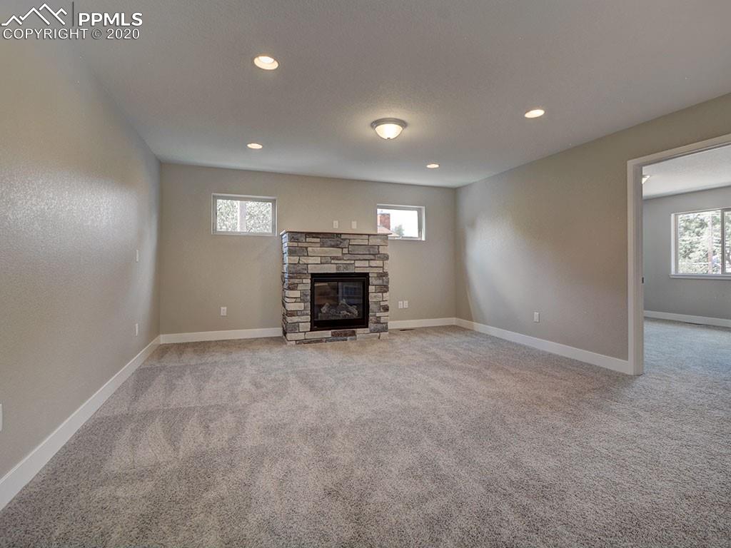 208 Custer Avenue Colorado Springs, CO 80903 - Photo 25 of 36 Upper level loft! Open! CF pre-wire under the mushroom light fixture.