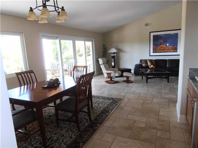 16170 Country Day Road Poway, CA 92064 - Photo 9 of 25 FROM THE KITCHEN- THE DINING ROOM ,WET BAR AREA AND LIVING ROOM