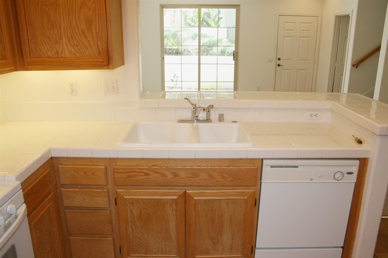 1464 Rancho Rose Way, Unit 25 Oceanside, CA 92057 - Photo 4 of 16 Kitchen opens to livingroom