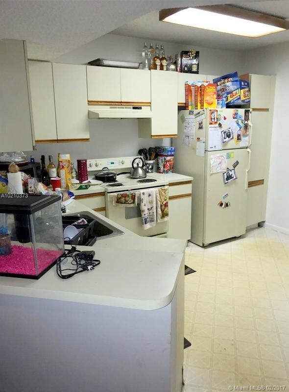8955 Wiles Road, Unit 303 Coral Springs, FL 33067 - Photo 2 of 6