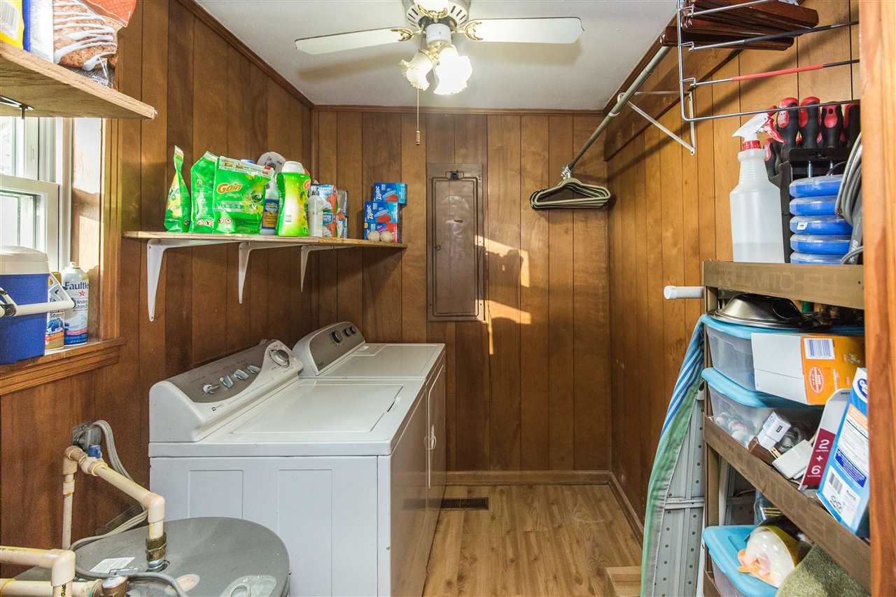 265 Belmont Road Mason, TN 38049 - Photo 11 of 14 Large laundry room has plenty of room for storage.