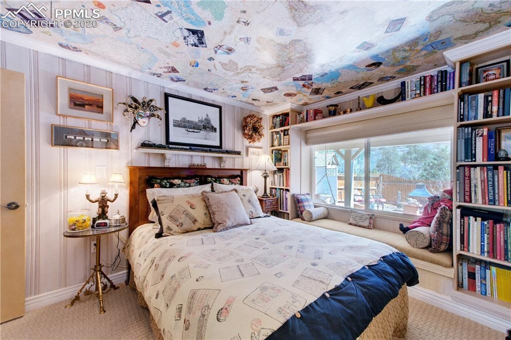 7955 Highway 24 Cascade, CO 80809 - Photo 26 of 36 Lower level bedroom