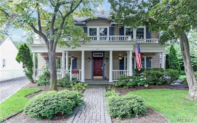 Charming front porch colonial on quiet cul de sac offers tranquil setting close