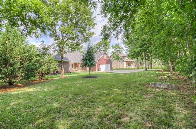 ANOTHER PICTURE OF YOUR BACK YARD...THIS ONE SHOWS THE BREATH TAKING VIEWS OF MATURE TREES AND LANDSCAPING...
