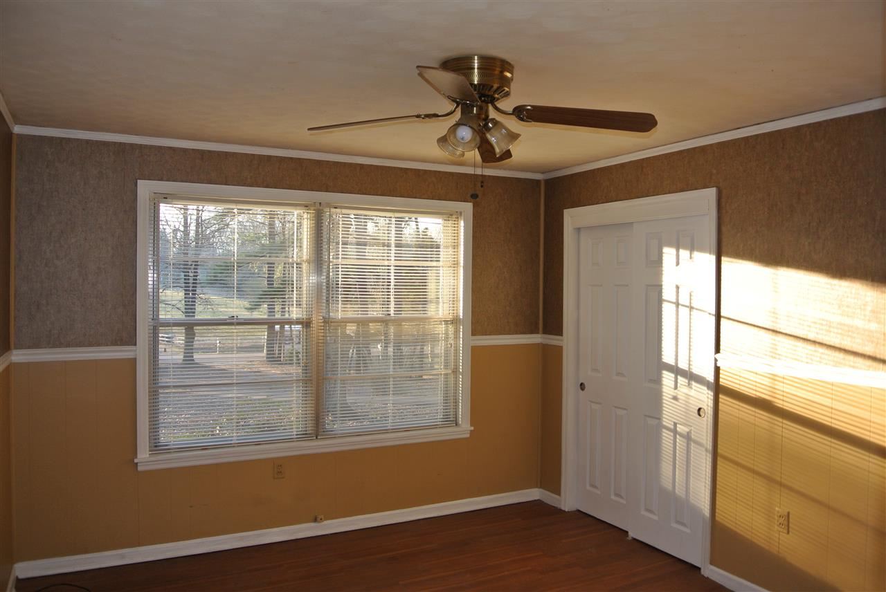 4384 Broadway Road Bartlett, TN 38002 - Photo 13 of 24 Second bedroom with wood floors and ceiling fan.