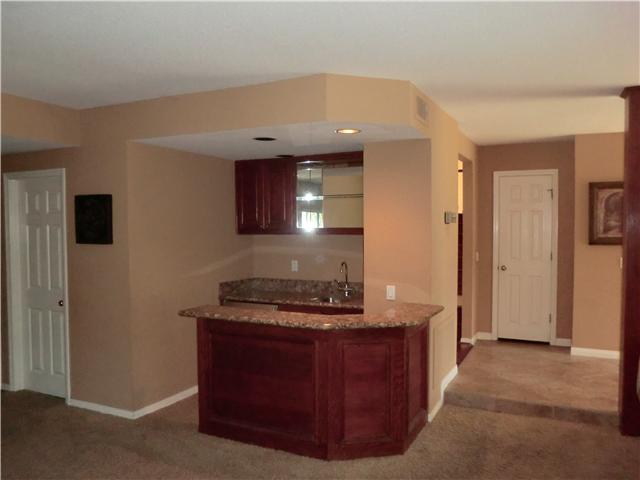 12912 Stone Canyon Road Poway, CA 92064 - Photo 15 of 24 wet bar off family room & kitchen