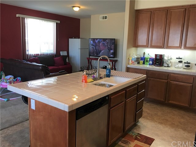 692 Apache Street San Jacinto, CA 92582 - Photo 10 of 36 Kitchen island