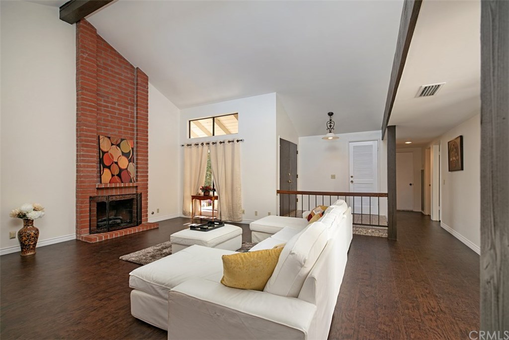 5001 Paseo Dali Irvine, CA 92603 - Photo 3 of 14 Spacious Living Room with wood burning fireplace