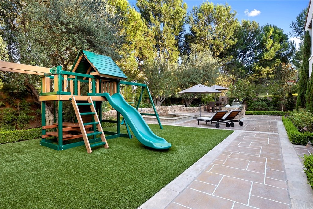 20 Highpoint Irvine, CA 92603 - Photo 3 of 65 Oversized yard featuring a large area of low maintenance artificial turf