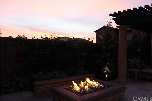 17 Rawhide Irvine, CA 92602 - Photo 34 of 56 Top of the line salt water pool features large waterfall, LED lights, connected jacuzzi spa covered by outdoor structure. High end equipment (Pentair and Jandy) with mobile app control of pool features. Cost of private luxury is kept low with 12-panel 3.7 kilowatt solar power ($125 average electric bill including heating and use of pool features).