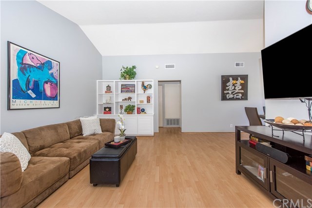 131 Remington, Unit 239 Irvine, CA 92620 - Photo 6 of 36 Entertain lots of family and friends in your spacious living area!