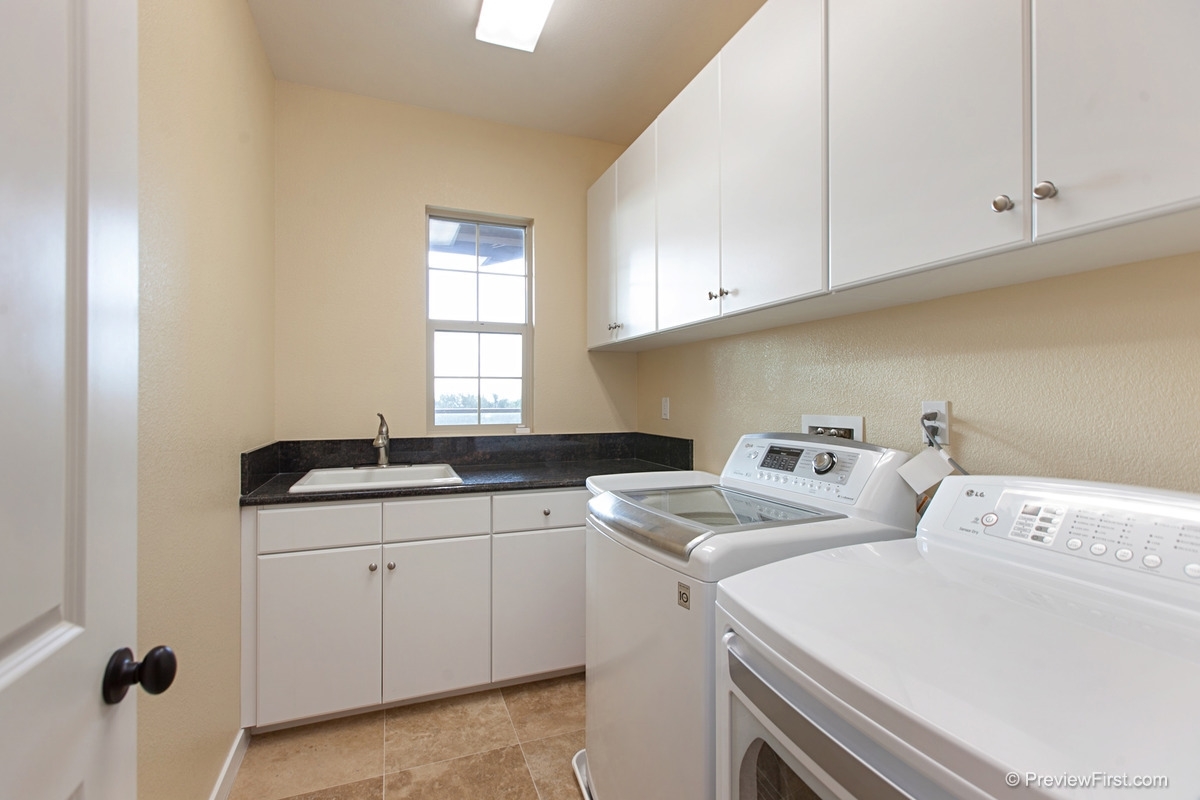 915 Saxony Road Encinitas, CA 92024 - Photo 23 of 25 Upstairs laundry room