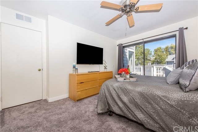 131 Remington, Unit 239 Irvine, CA 92620 - Photo 18 of 36 Large sliding door to patio lets lots of light in!