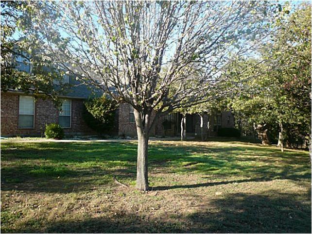 501 Diamond Point Drive Oak Point, TX 75068 - Photo 1 of 1 Custom 1.5 story home nestled on a heavily treed 1 acre corner lot.