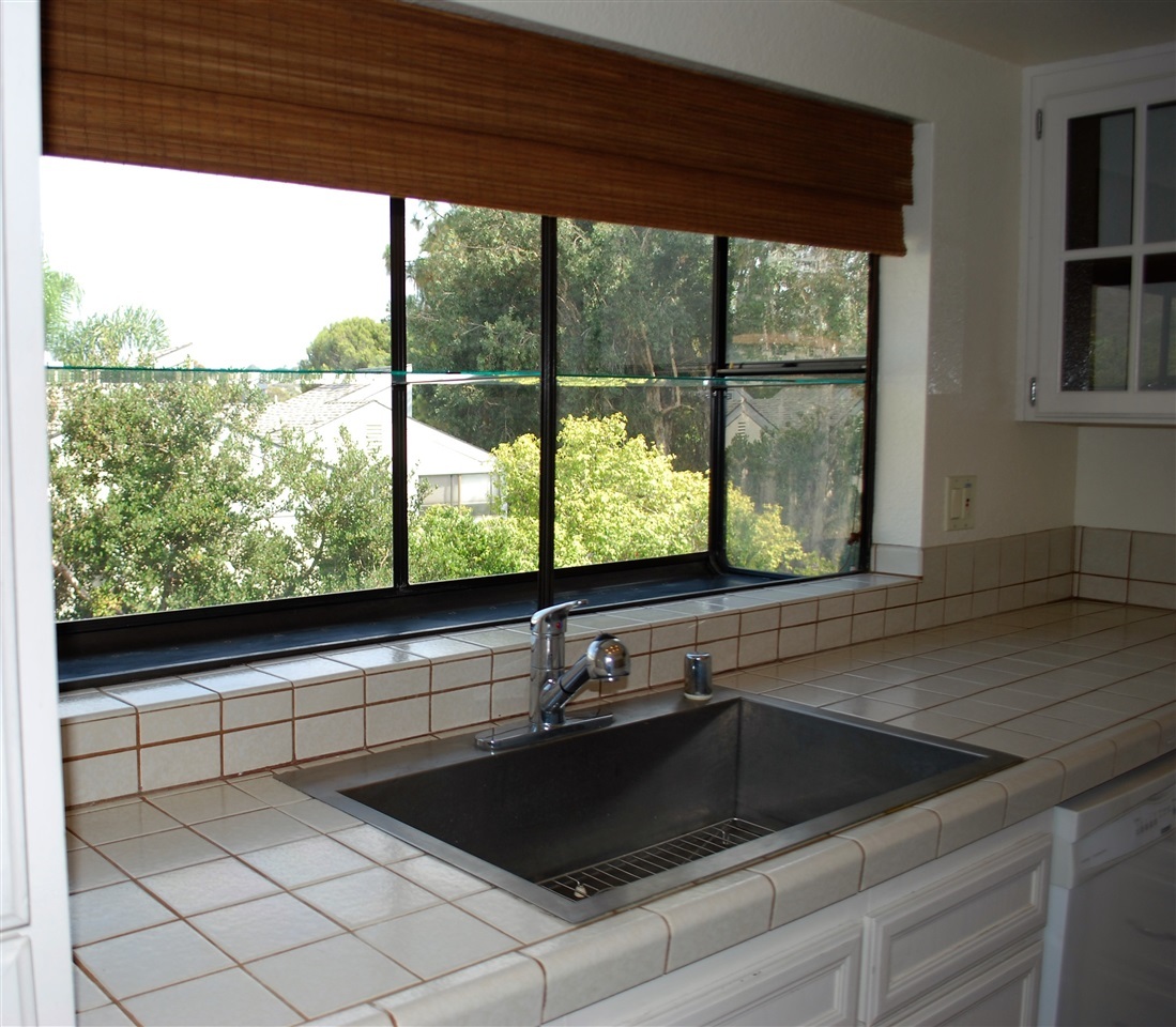 2372 Altisma Way, Unit C Carlsbad, CA 92009 - Photo 4 of 16 garden window with hillside view
