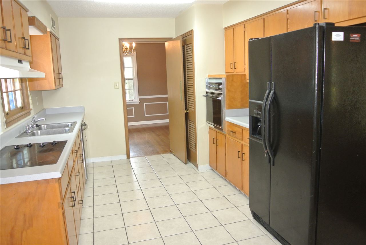 4305 Rhodes Avenue Memphis, TN 38111 - Photo 7 of 24 The kitchen comes equipped with range/oven, smooth cooktop, dishwasher, and refrigerator.