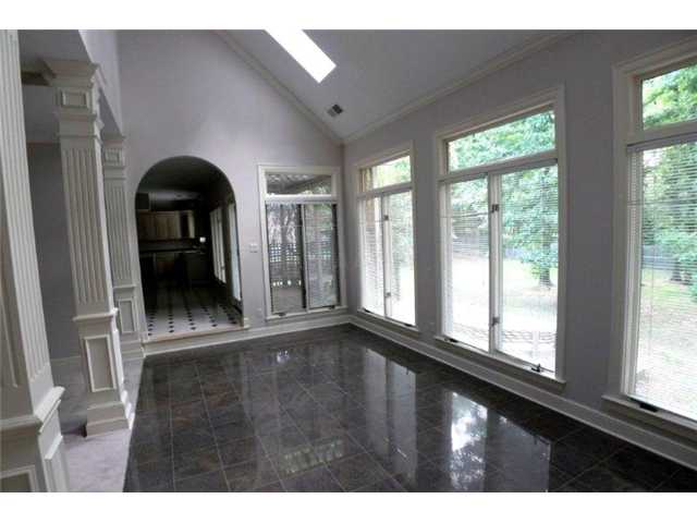 20 Summer Grove Road Cordova, TN 38018 - Photo 17 of 21 Vaulted Sun Room with Granite Floors and Sky Lights